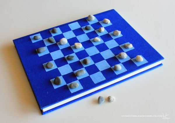 Book-for-Checker-Board-Playing-with-Rock-Pieces